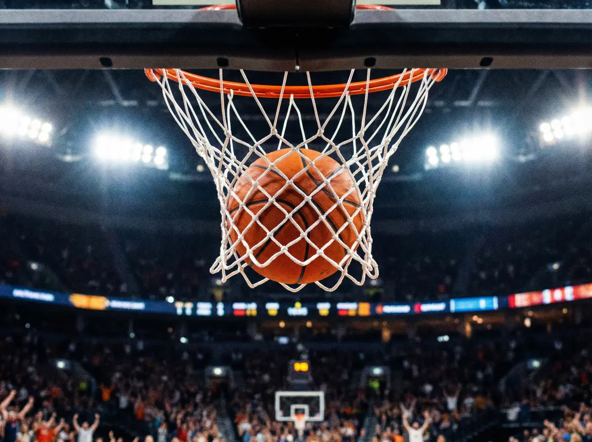 篮球穿过篮网瞬间的特写，象征着一次完美的三分命中 - 内射